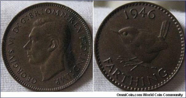 EF 1946 farthing, interersting burn mark, possibly placed on a cooking ring or something hot been placed on it