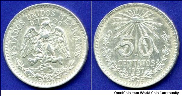 50 centavos.
Estados Unidos Mexicanos.
'Mo' - Mexico mint.
Mintage 20,000,000 units.


Ag720f. 8,33gr.
