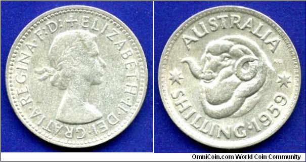Shilling.
Elizabeth II Dei Gratia Regina F:D:+.
Mintage 10,876,000 units.


Ag500f. 5,65gr.