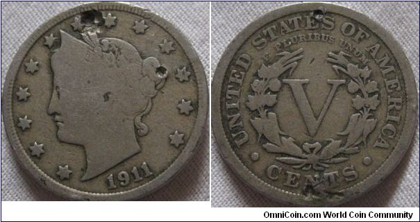 1911 V cent in poor condition, and some drilling attempts on the obverse, otherwise its acceptable