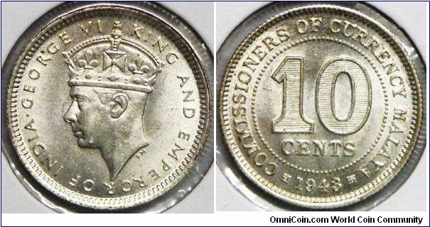 2.7100 gram, 0.5000 Silver 0.0436 oz. ASW. Obv: Crowned head of King George VI Rev: Value within beaded circle Mintage: 5,000,000. A gift from my mentor, tough to find a Gem BU grade for this coin, great eye appeal.