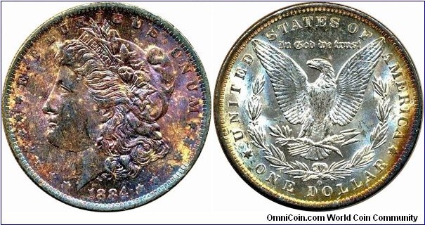 1884-O, nice obverse purple gold rainbow toned. Choice example.