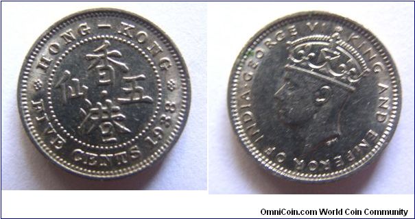 about UNC grade 1938 years 5 Cents,Hong Kong,it has 16.5mm diameter,weight 2.4g.