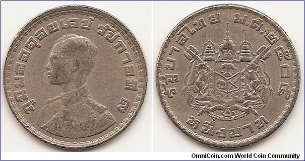 1 Baht -BE2505- 
Y#84
Copper-Nickel, 26.9 mm. Ruler: Bhumipol Adulyadej (Rama IX Obv: Young bust left Rev: Mantled arms Edge: Reeded