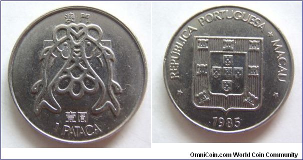 UNC grade 1985 years 1 Dollar .Macau.It has 26mm diameter,weight 9.1g