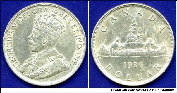 1 Dollar (Voyager).
George V (1910-1936).
Mintage 339,600 units.


Ag800f. 23,32gr.