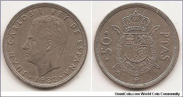 50 Pesetas
KM#825
12.3500 g., Copper-Nickel, 30 mm. Ruler: Juan Carlos I Obv: Head left Rev: Crossed scepters and shield within order collar, crown above Note: Mint mark: Crowned M.