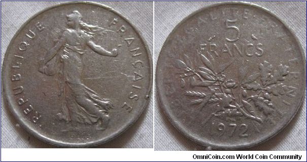 5 franc coin, seen full circulation life and as result is showing detail loss on the legend