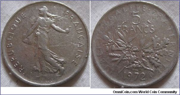 5 franc coin, seen full circulation life and as result is showing detail loss on the legend