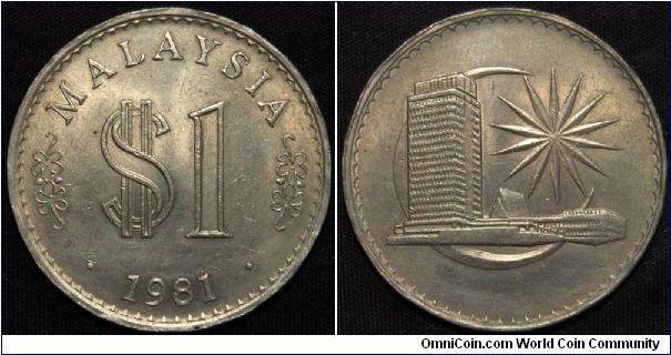 Malaysi 1981 1 Ringgit.
Copper-Nickel, 33.5mm. 
Obv: Artistic value and dollar sign above date
Rev: Parliament house within cresent, BANK NEGARA MALAYSIA
Mintage: 765,000