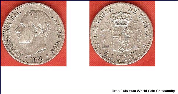 50 centimos
Alfonso XII, by the grace of God, Constitutional King of Spain
0.835 silver