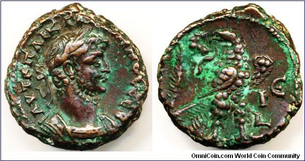 EGYPT, Gallienus Potin, Alexandria, Æ Tetradrachm, yr. 15th (267-268 AD). 10.34mm, 21.10 ~ 21.67mm, bronze. Obv. AVT K Π ΛIK ΓAΛΛIHNOC CEB, Laureate draped cuirassed bust right. Rev. LIE, Eagle standing right, head left, holding wreath. Palm branch left, regnal year right. Milne 4175 var (?). Green patina, good very fine.