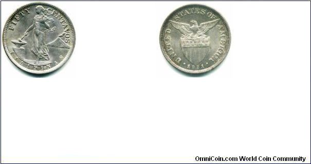 US-Philippine 1921 50 centavo silver coin.
27.5mm diameter
weak strike on the year #s 9 and 2 thanks nic!