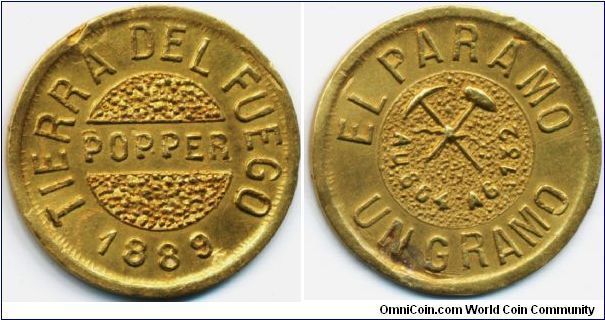 Tierra Del Fuego Gold Gramo 1889. Private issue by Julius Popper, a Romanian Jewish immigrant who had abtained mining rights on this island now ruled by Argentina and Chile. One of the classic private issues of Latin numismatics. This specimen edge/rim marks suggest it's likely ex-jewelry.  Very rare.
