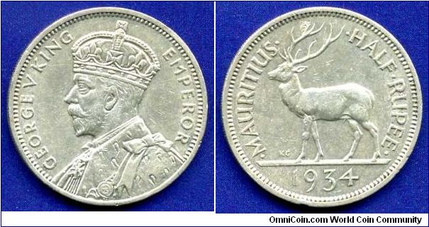 Half Rupee.
George V (1910-1936).
Mintage 1,000,000 units.


Ag917f. 5,8gr.