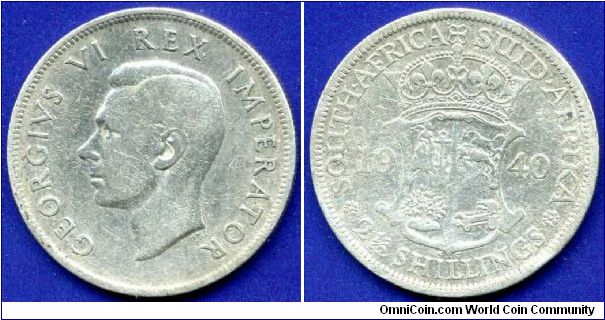 *2-1/2 shillings*.
George VI (1936-1952) Rex & Imperator.
Mintage 2,976,000 units.


Ag800f. 14,14gr.