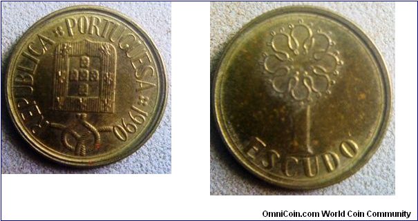 Portugal Brass 1 escudo coin. a small coin at 
16.3mm diameter