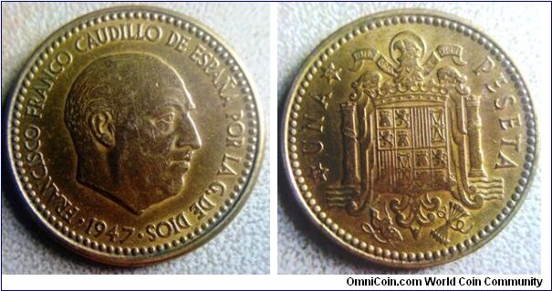 a 1947 un peseta brass coin with very nice toning like gold.
21mm diameter