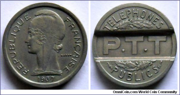 French telephone token. 1937, P.T.T
(Telephones Publics)