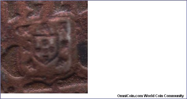 Detail to BR09A: Countermark that double the value of the host coins for the copper ones; different from the one shown in Krause as it has more rounded botom of the inner shield; countermark itself is at least fine