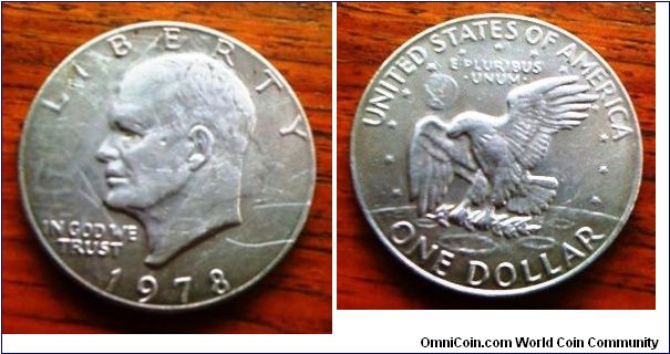 The classic 1978 Eisenhower non-silver One Dollar with the Rev Eagle at 38mm diameter