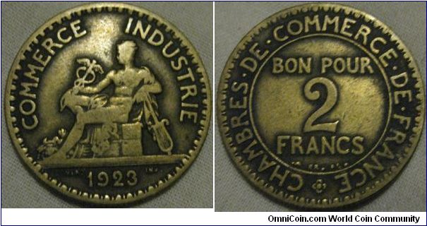 1923 2 francs, worn grade.
