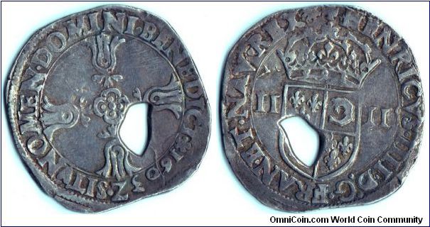 scarcer quart d'ecu (1/4 ecu)`Dauphine' struck for Henri IV of France at Grenoble mint. This example has had a piece stamped out from it. Have never found out what this indicates, but it has not been done for jewellery purposes. More likely cut for use in the colonies.