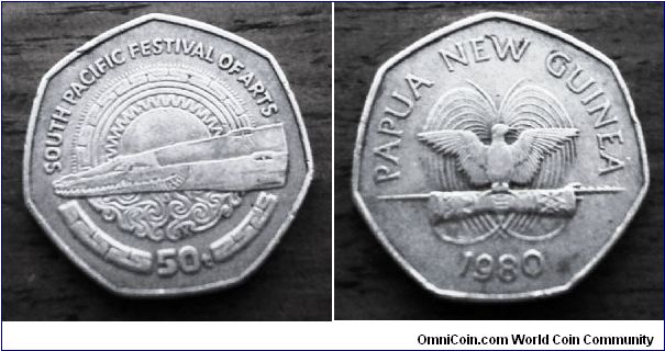 1980 Papua New Guinea large coin at 30mm diameter, denomination 50t with nice crocodile at Rev and Peacock at Obv. very nice artwork on a seven sided coin
