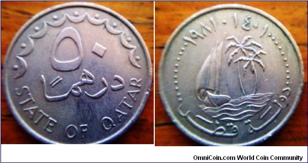 Qatar coin of 25mm diameter. cannot read the coin so the year date is just a guess! it's a nice looking coin with the boat and palm trees