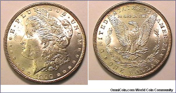 Morgan Silver Dollar, .900 silver, .7736 oz ASW, MS-63, nice edge toning.