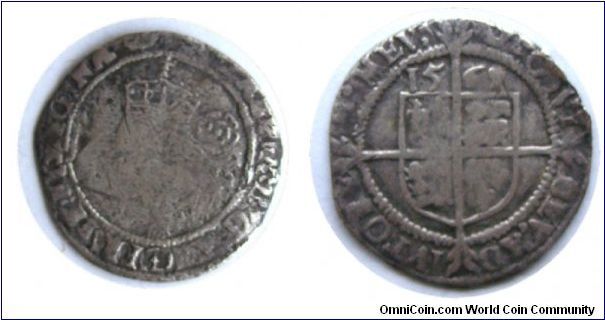 Elizabeth I
Sixpence 
mm Escallop