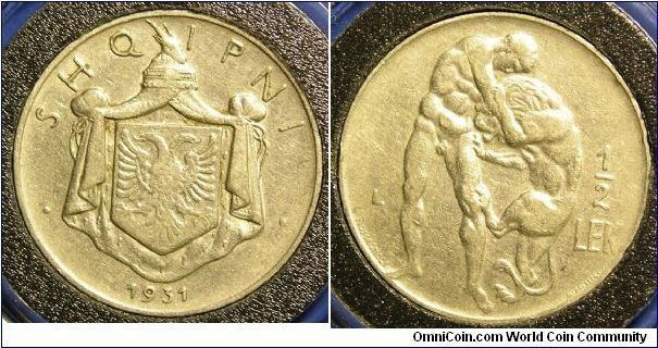 1931L Half Lek

Nickel


Obv: King's Arms

Rev: Hercules wrestling Nemean lion

Mintage: 500,000

KM# 13