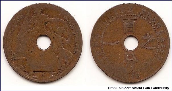 1 Cent - French Indo-China - 
KM# 12.1
Bronze, 26 mm. Obv: Center hole within statue, denomination below, mint mark “A” for Paris mint Rev: Symbols at four sides of center hole within circle, date below