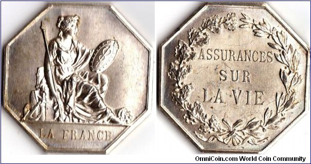 silver jeton engraved by V Janvier and issued for `La France' a French assurance company covering diverse risks, the one depicted by this particular jeton being `Life'.