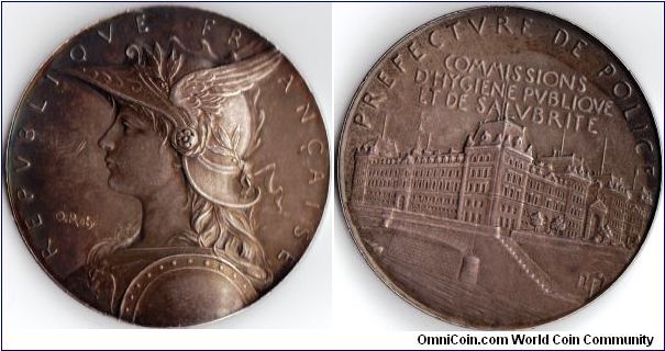 silver medal by Louis Oscar Roty for the Parisian `Public Health Authority` circa 1889 -1890. Not quite sure when this medal was struck. This one is numbered 14 on the edge.