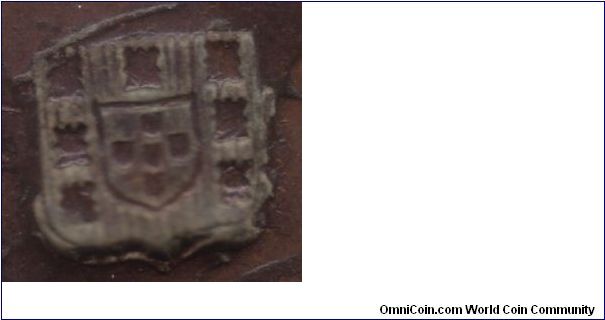 Detail for BR09C: Shield countermark with 7 castles surrounding smaller inner shield area with 4 shields, lower castles are straight and not angled as on BR09A