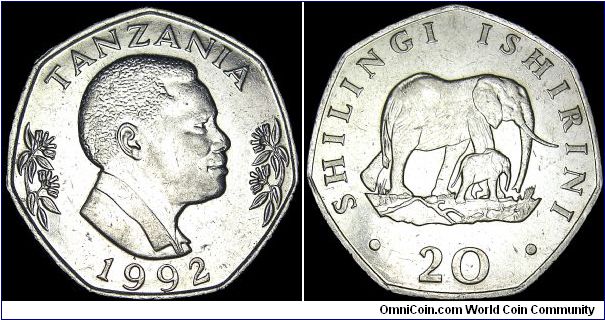 Tanzania - 20 Shilingi - 1992 - Weight 13 gr - Nickel bonded steel - Size 31 mm - President / Ali Hassan Mwinyi (1985-95) - Obverse / President Mwinyi right flanked by flowers - Reverse / Elephant with calf - Edge : Plain - Shape : 7-sided - Reference KM# 27.2 (1992)