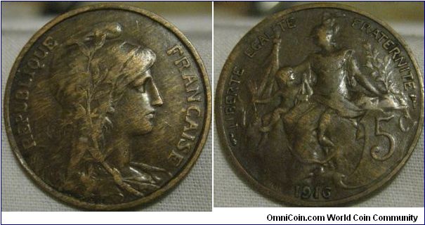 1916 5 centimes, great looking piece, little wear and has toned dark.