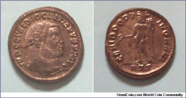 Billon follis issued under Diocletian. Depicts Genius of the Romans