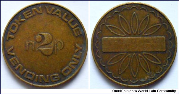 2p. token from UK.
For vending machines only.