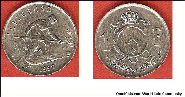 1 franc
man working field
monogram of grand-duchess Charlotte
copper-nickel
designer: Armand Bonnetain
size:21 mm