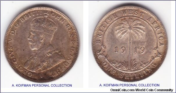 KM-12, 1919 British West Africa shilling, Heaton mint (H mintmark); silver, reeded edge; lower mintage good very fine condition, toned.