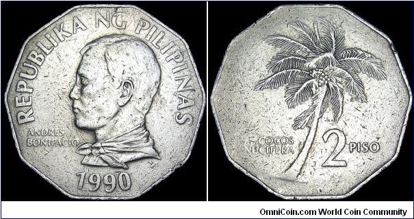 Philippines - 2 Piso - 1990 - Weight 12,0 gr - Copper / Nickel - Size 31 mm - President / Corazon Aquino (1986-92) - Obverse / Head of Andres Bonifacio (Filipino Nationalist 1863-97) - Reverse / Coconut palm - Edge : Plain - Shape : 10-Sided - Reference KM# 244 (1983-90)