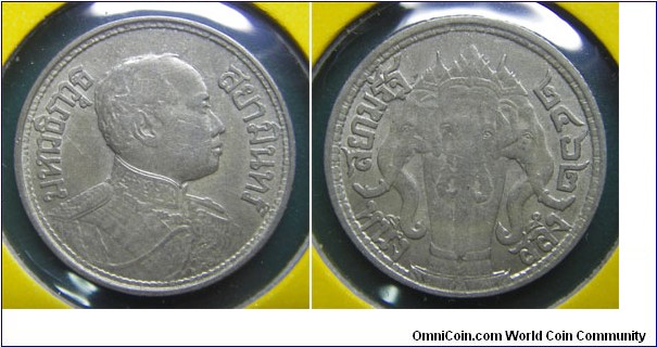 Y# 43 SALUNG = 1/4 BAHT
3.7500 g., 0.8000 Silver 0.0964 oz. ASW Ruler: Rama VI Obv:Bust right Rev: Elephant heads flank facing elephant