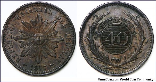 Copper 40 Centesimos. 1857-D. EF+/AU. Few minor rim bumps.
