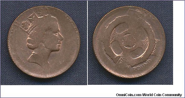 Northern Islands 1 pound struck on british 1 penny planchet no date due to weak strike 