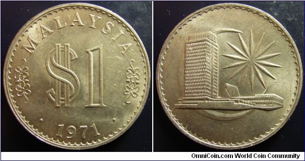 Malaysia 1971 1 ringgit. Some marks but UNC. 
