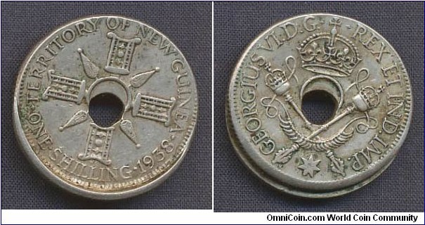 New Guinea (Australian territory) 1 Shilling offcent as well as hole, some dirt