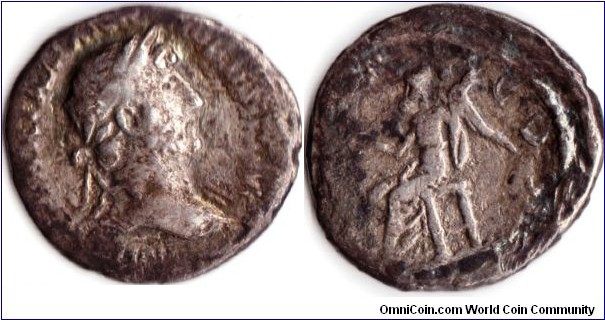 silver `quinarius' of Hadrian as caesar. In this example Victory is seated and facing to the left. hadrian is cuirassed ( RIC 108c)