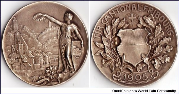 Silver Swiss shooting medal issued for the festival at Fribourg in 1905. This one engraved by Holy Freres with a mintage of 300.
